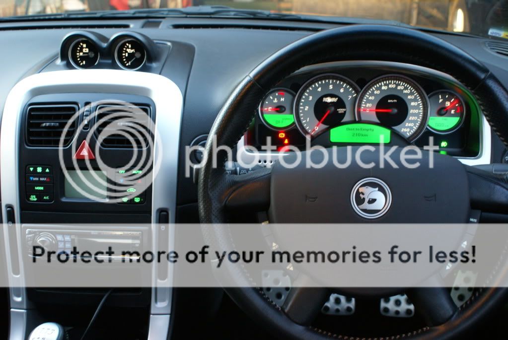 Can vz r8 gauges be installed in a vz with dash pop up compartment?