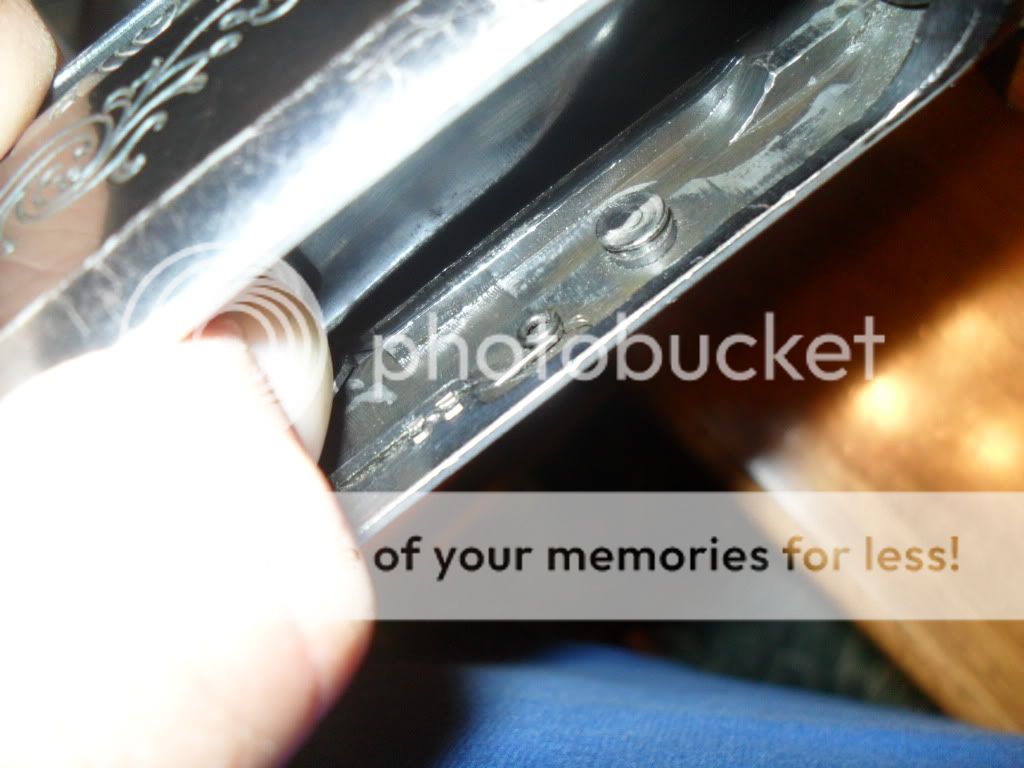 Broken 1100 interceptor latch spring | Shotgun Forum